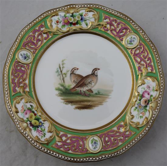 An English porcelain seventeen piece ornithological dessert service